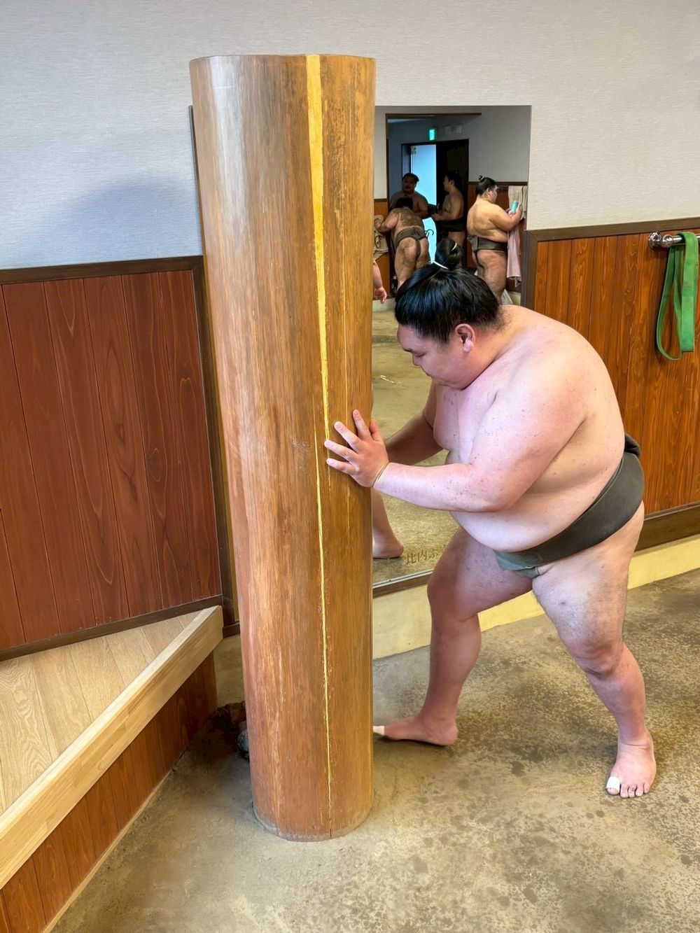 Wrestler training at the teppo pillar
